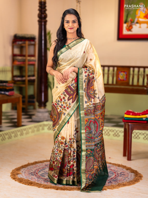 Pure printed silk saree beige and green with allover kalamkari prints and zari woven border