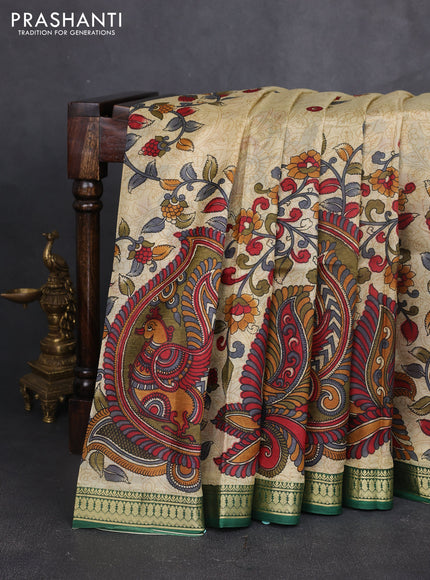 Pure printed silk saree beige and green with allover kalamkari prints and zari woven border