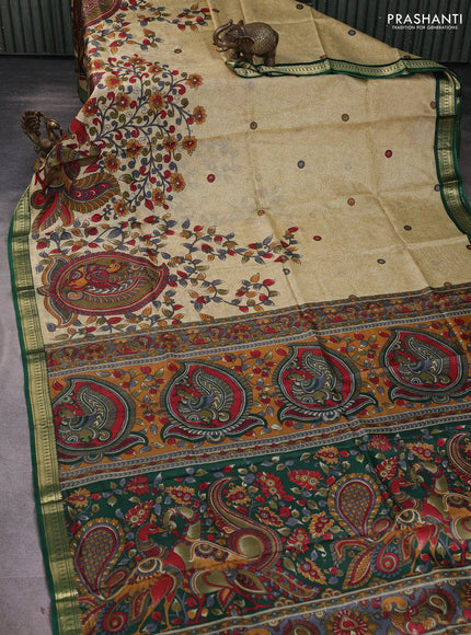 Pure printed silk saree beige and green with allover kalamkari prints and zari woven border
