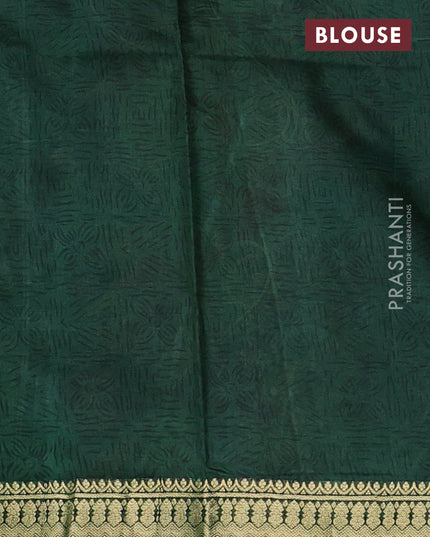 Pure printed silk saree beige and green with allover kalamkari prints and zari woven border