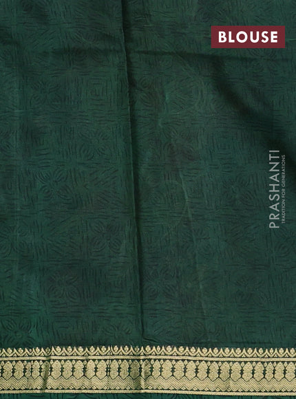 Pure printed silk saree beige and green with allover kalamkari prints and zari woven border