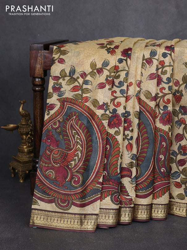 Pure printed silk saree beige and coffee brown with allover kalamkari prints and zari woven border