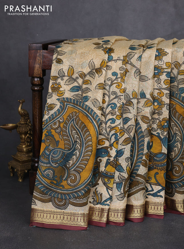 Pure printed silk saree beige and wine shade with allover kalamkari prints and zari woven border