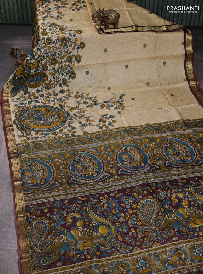 Pure printed silk saree beige and wine shade with allover kalamkari prints and zari woven border