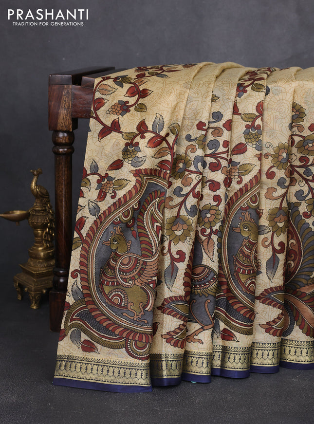Pure printed silk saree beige and navy blue with allover kalamkari prints and zari woven border
