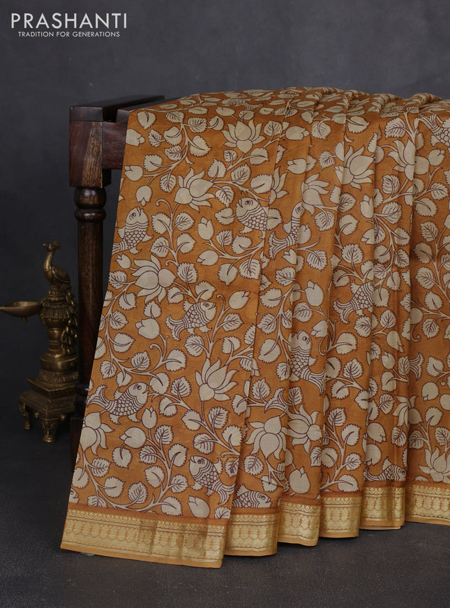 Pure printed silk saree mustard yellow with allover kalamkari prints and zari woven border