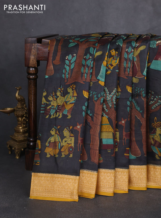 Pure printed silk saree black and mustard yellow with allover kalamkari prints and thread woven border