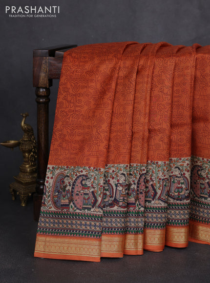 Pure printed silk saree orange with allover prints and madhubani printed zari woven border