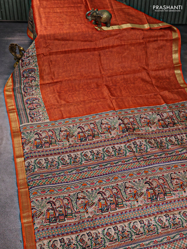 Pure printed silk saree orange with allover prints and madhubani printed zari woven border