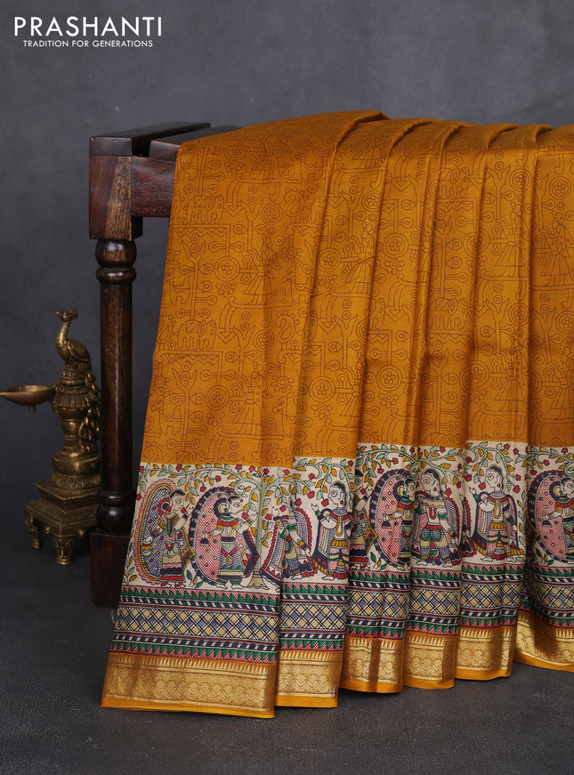 Pure printed silk saree mustard yellow with allover prints and madhubani printed zari woven border