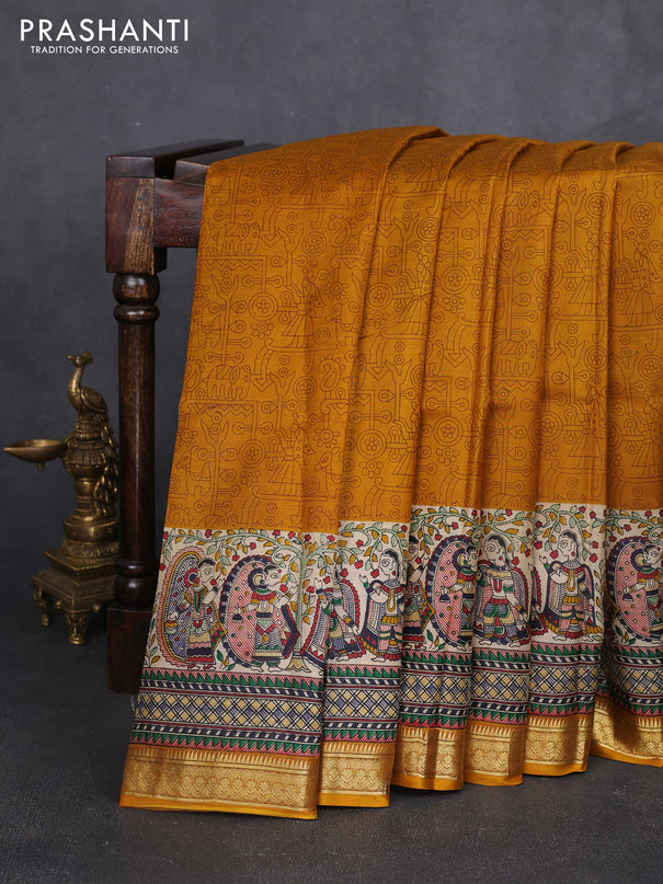 Pure printed silk saree mustard yellow with allover prints and madhubani printed zari woven border