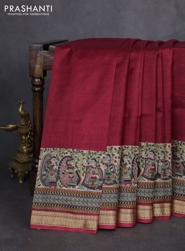Pure printed silk saree maroon with allover prints and madhubani printed zari woven border
