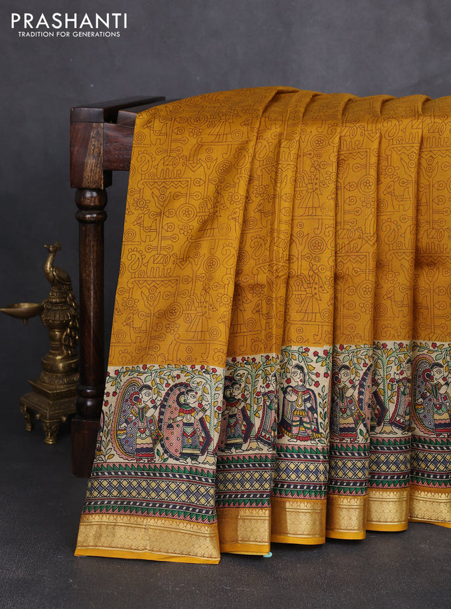 Pure printed silk saree mustard yellow with allover prints and madhubani printed zari woven border