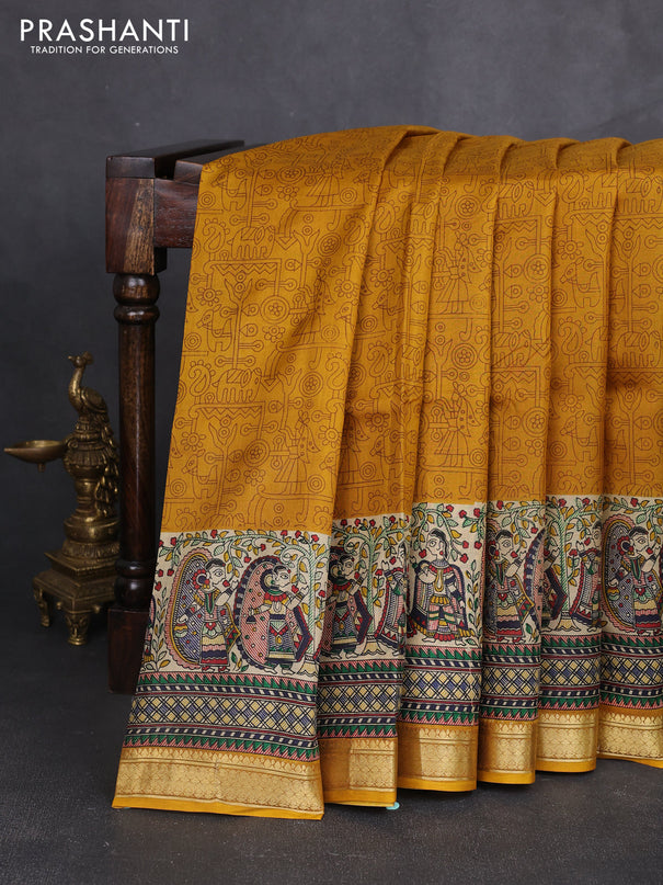 Pure printed silk saree mustard yellow with allover prints and madhubani printed zari woven border