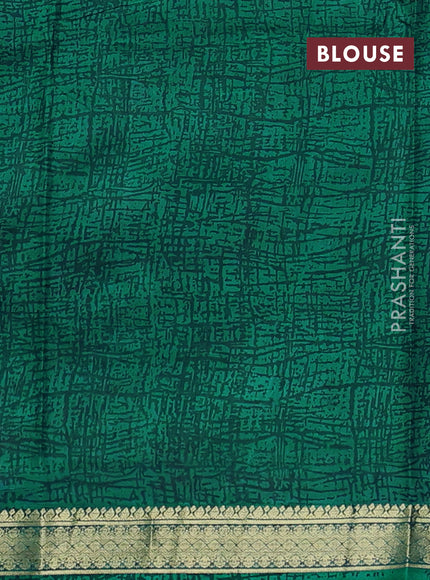 Pure printed silk saree teal green with allover prints and madhubani printed zari woven border