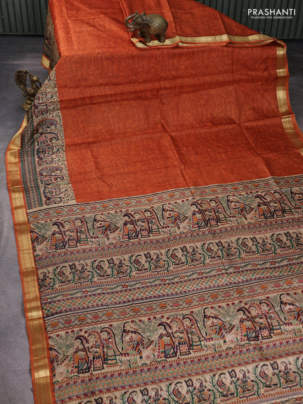 Pure printed silk saree orange with allover prints and madhubani printed zari woven border