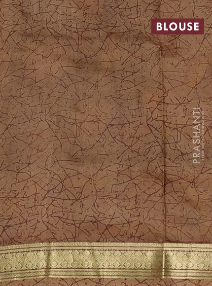 Pure printed silk saree black and sandal with allover kalamkari prints and zari woven border