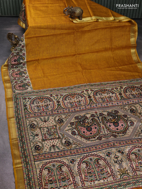 Pure printed silk saree mustard yellow with allover prints and madhubani printed zari woven border
