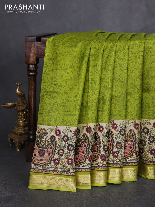 Pure printed silk saree light green with allover prints and madhubani printed zari woven border