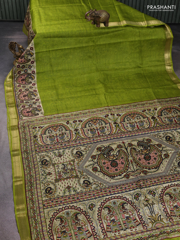 Pure printed silk saree light green with allover prints and madhubani printed zari woven border