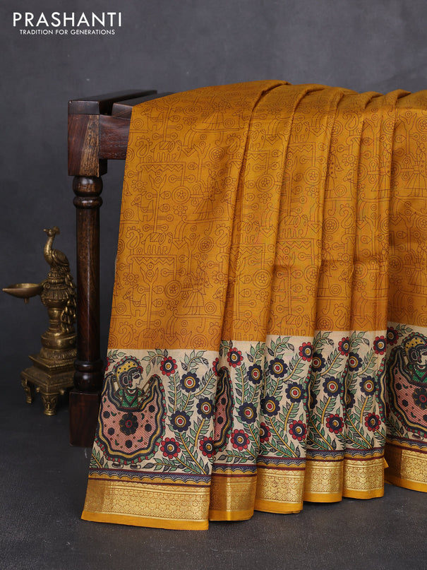 Pure printed silk saree mustard yellow with allover prints and madhubani printed zari woven border
