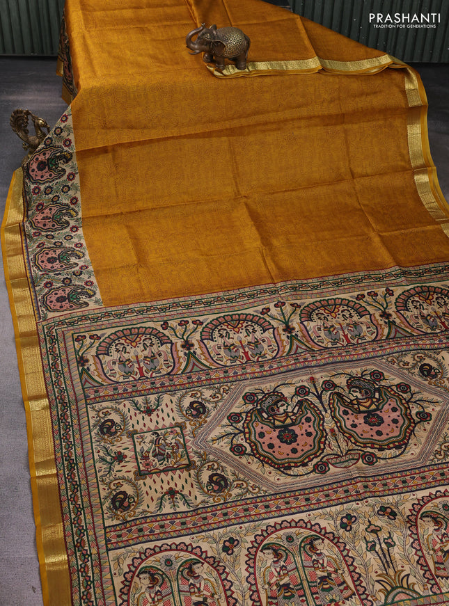 Pure printed silk saree mustard yellow with allover prints and madhubani printed zari woven border