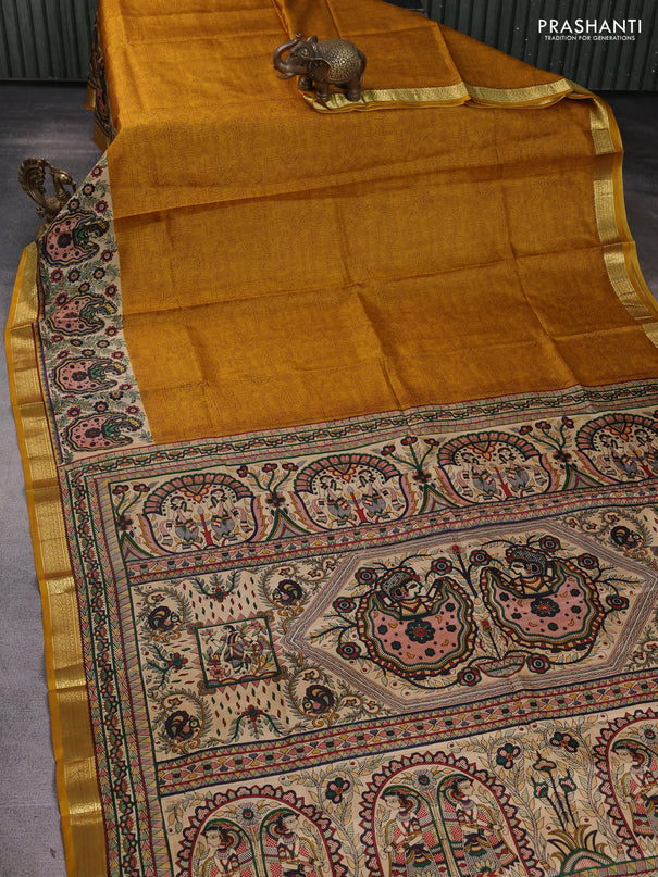 Pure printed silk saree mustard yellow with allover prints and madhubani printed zari woven border