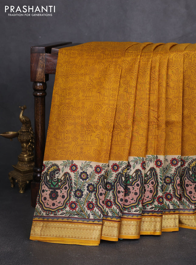 Pure printed silk saree mustard yellow with allover prints and madhubani printed zari woven border