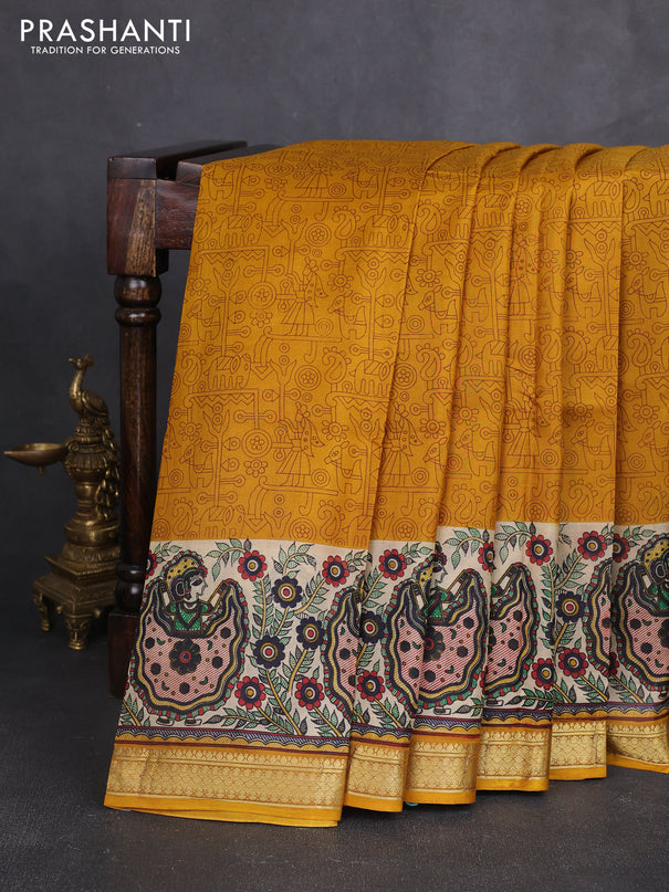 Pure printed silk saree mustard yellow with allover prints and madhubani printed zari woven border