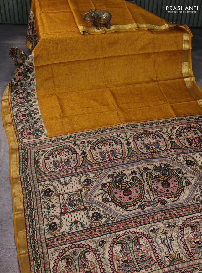 Pure printed silk saree mustard yellow with allover prints and madhubani printed zari woven border