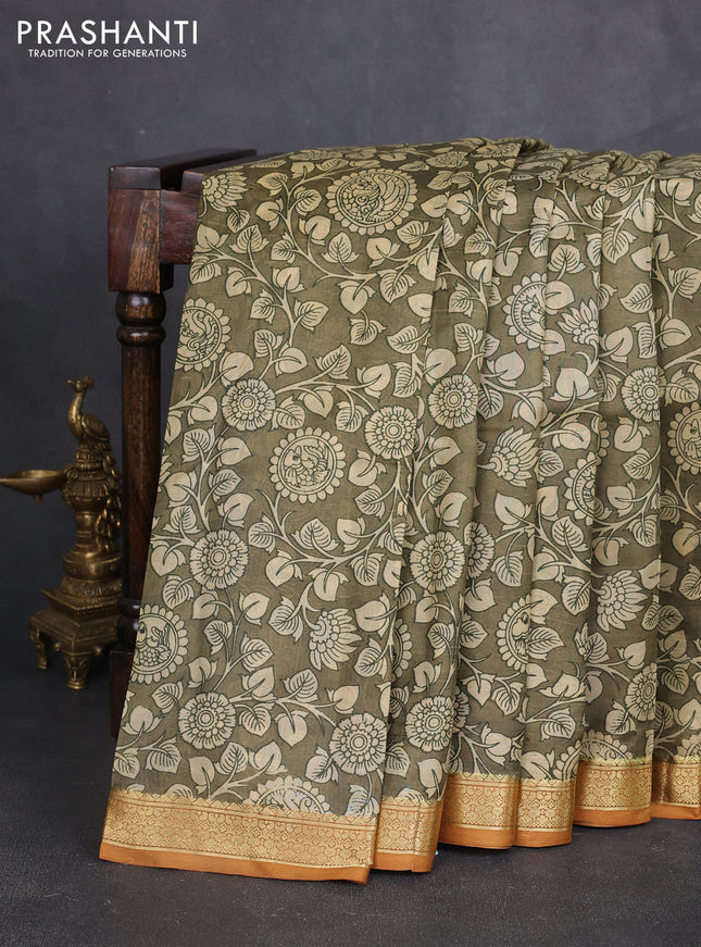 Pure printed silk saree olive green and mustard yellow with allover kalamkari prints and zari woven border
