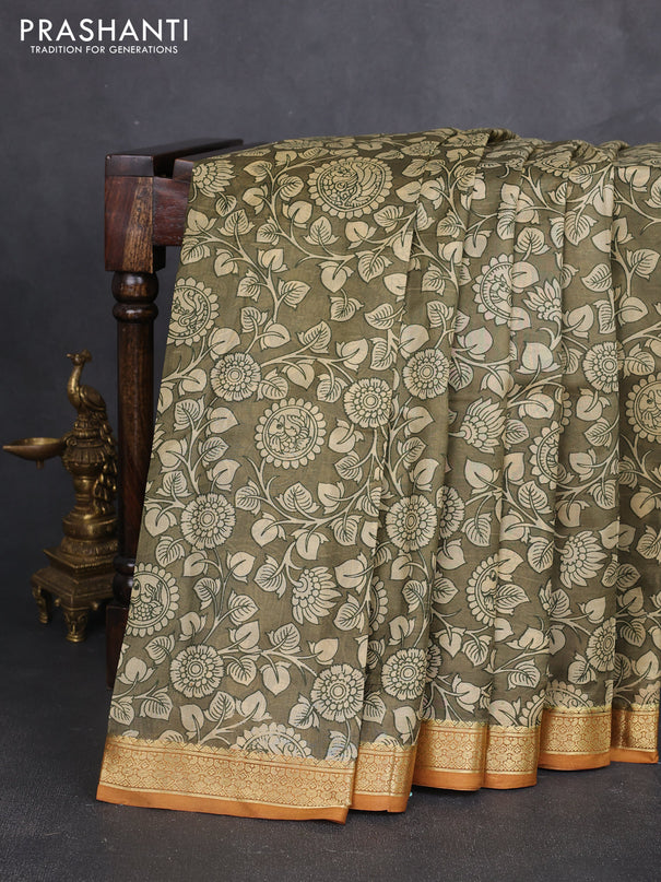Pure printed silk saree olive green and mustard yellow with allover kalamkari prints and zari woven border