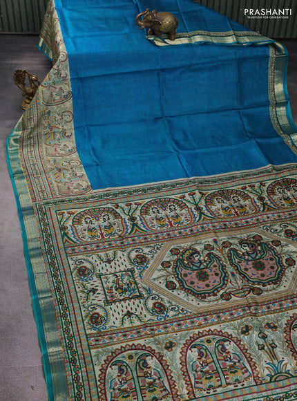 Pure printed silk saree cs blue with allover prints and madhubani printed zari woven border