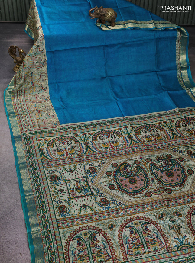 Pure printed silk saree cs blue with allover prints and madhubani printed zari woven border