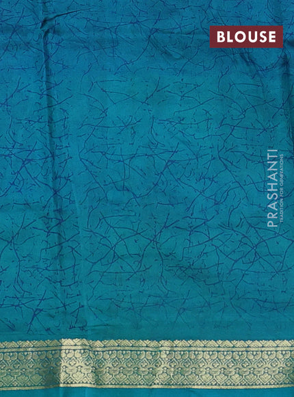 Pure printed silk saree cs blue with allover prints and madhubani printed zari woven border