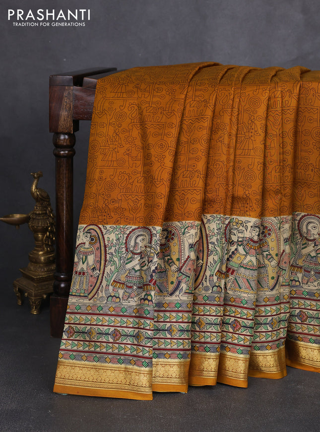 Pure printed silk saree mustard yellow with allover prints and madhubani printed zari woven border