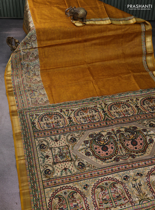 Pure printed silk saree mustard yellow with allover prints and madhubani printed zari woven border