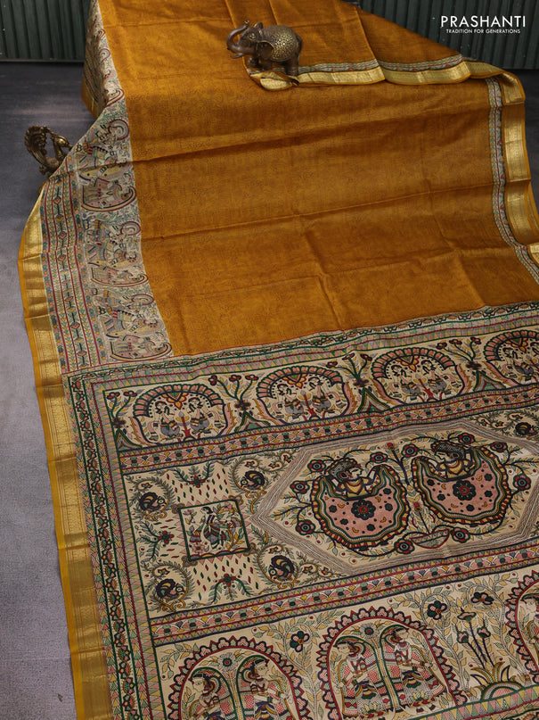 Pure printed silk saree mustard yellow with allover prints and madhubani printed zari woven border