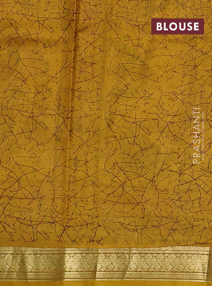 Pure printed silk saree mustard yellow with allover prints and madhubani printed zari woven border