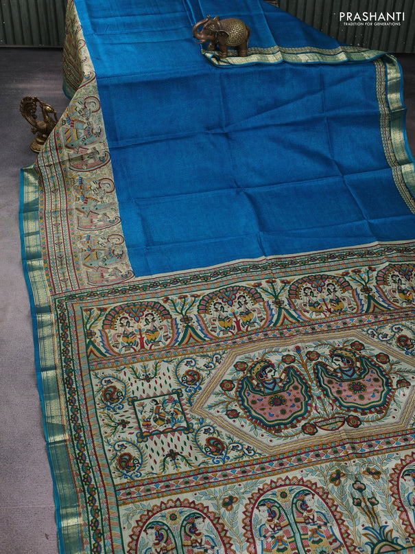 Pure printed silk saree cs blue with allover prints and madhubani printed zari woven border