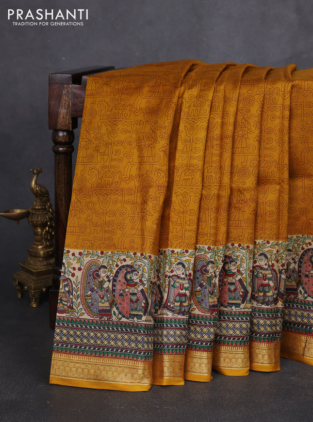 Pure printed silk saree mustard yellow with allover prints and madhubani printed zari woven border