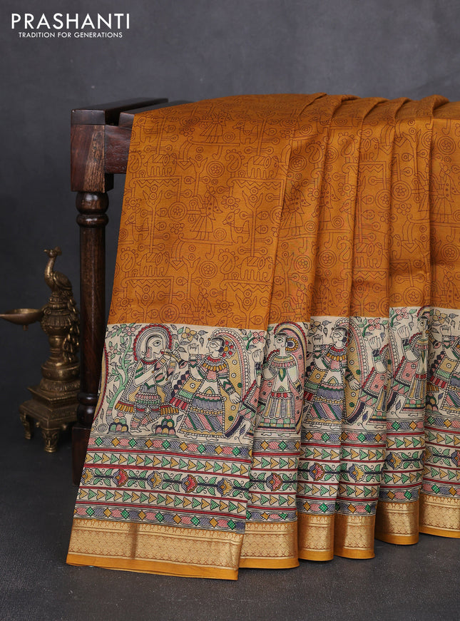 Pure printed silk saree mustard yellow with allover prints and madhubani printed zari woven border