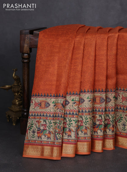 Pure printed silk saree orange with allover prints and madhubani printed zari woven border
