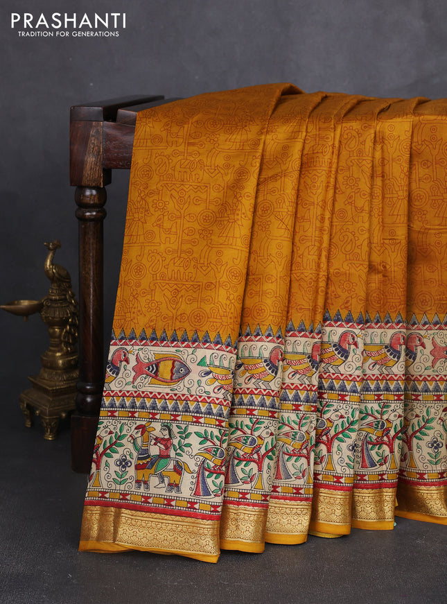 Pure printed silk saree mustard yellow with allover prints and madhubani printed zari woven border