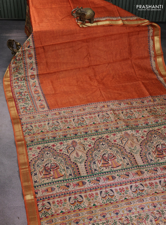 Pure printed silk saree orange with allover prints and madhubani printed zari woven border