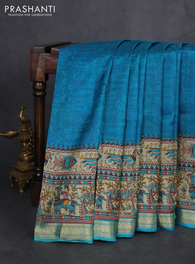 Pure printed silk saree teal blue with allover prints and madhubani printed zari woven border