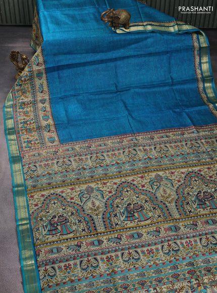 Pure printed silk saree teal blue with allover prints and madhubani printed zari woven border