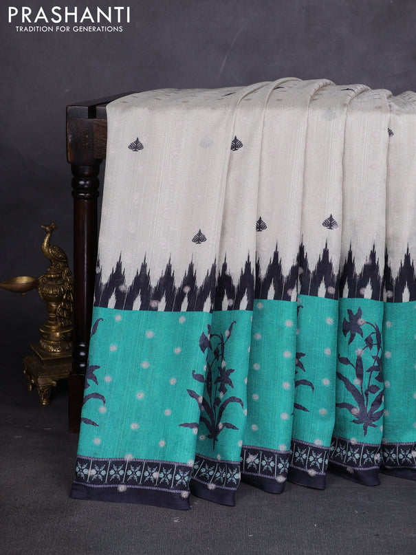 Matka tussar saree beige and teal green with allover thread buttas & butta prints and long temple design printed border