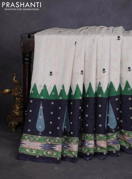 Matka tussar saree beige and green black with allover thread buttas & butta prints and long temple design printed border