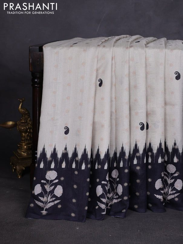 Matka tussar saree beige and black teal green with allover thread buttas & butta prints and long temple design printed border